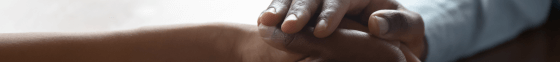 Two people holding hands.