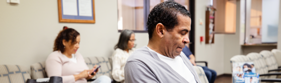 People sitting in a waiting room.